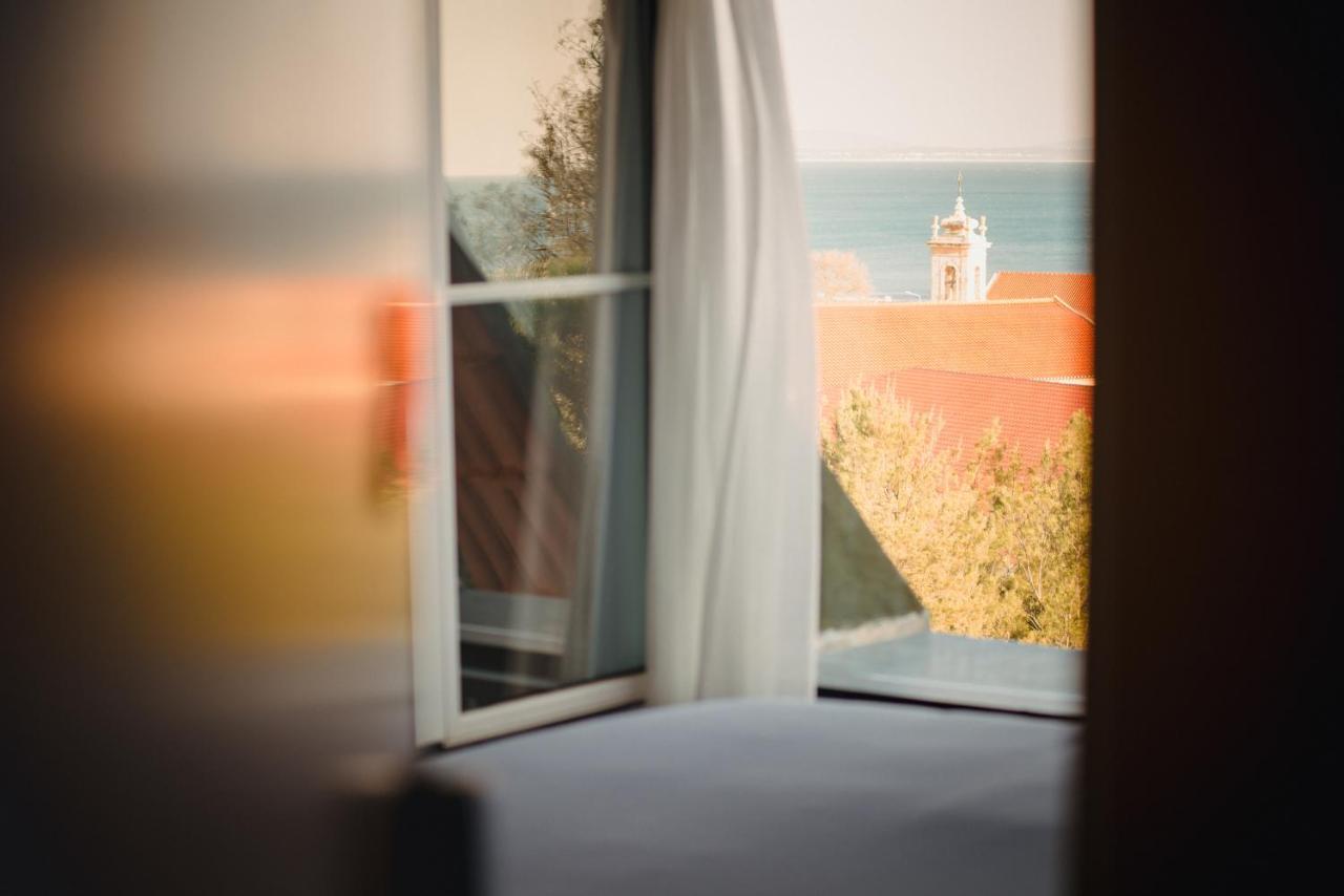 Hotel A House In Estoril - Adults Only Extérieur photo View of the lighthouse from the window of the house